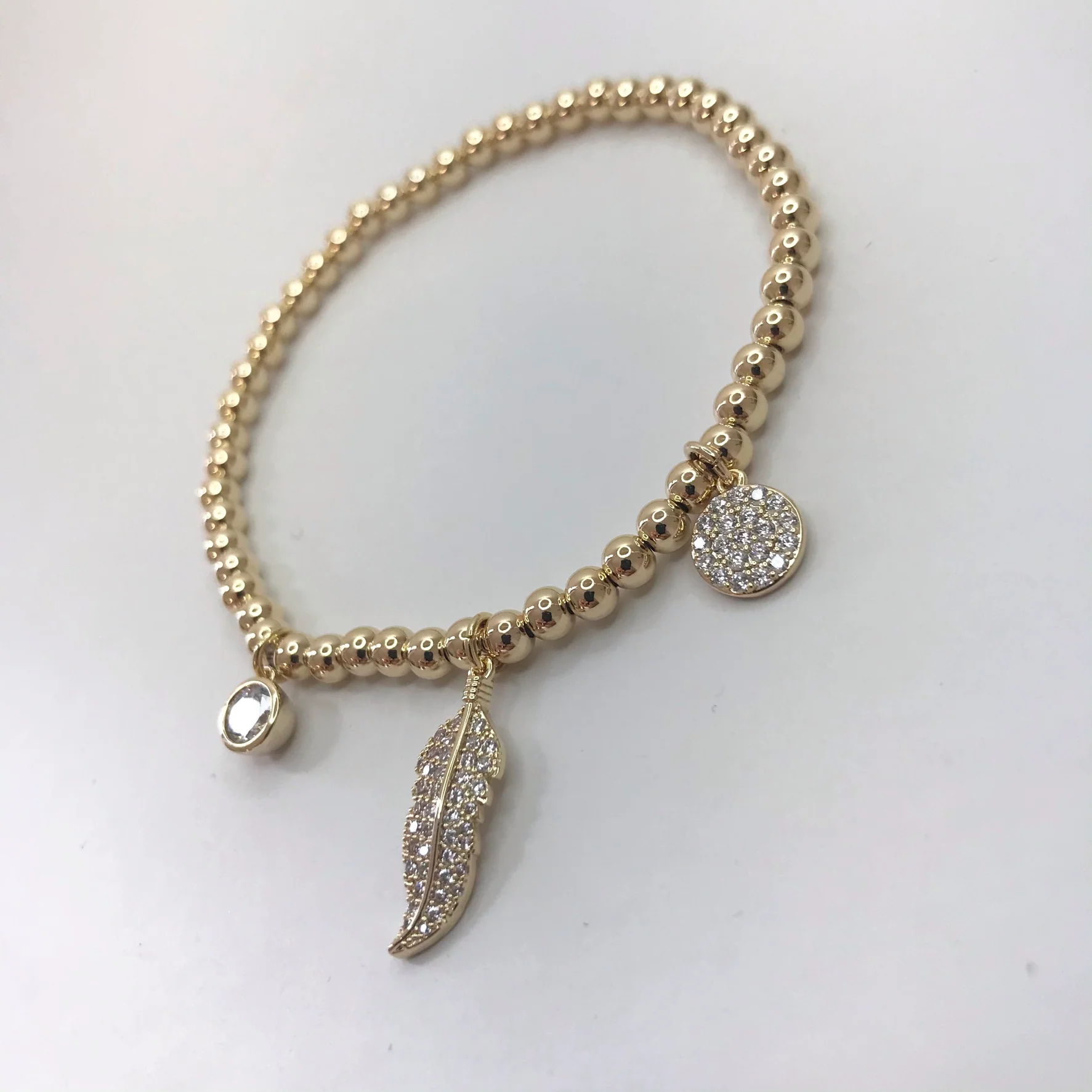 Absolute Floaty Feather Bracelet - Gold - Image 3