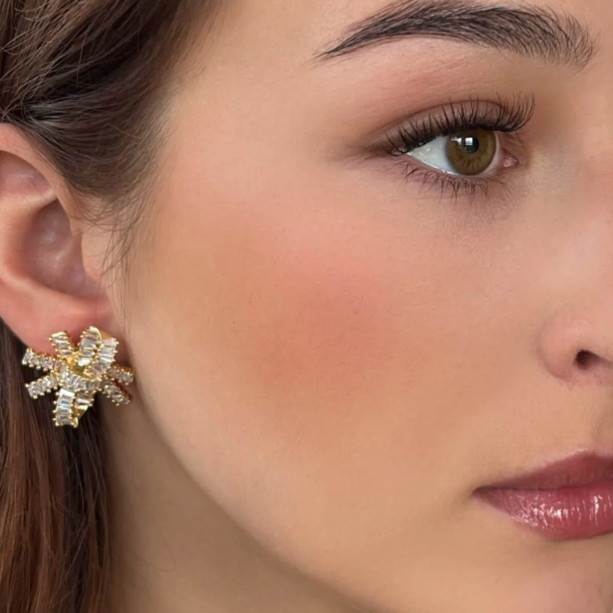 Absolute Gold Large Sparkly Bow Stud Earrings - Image 2